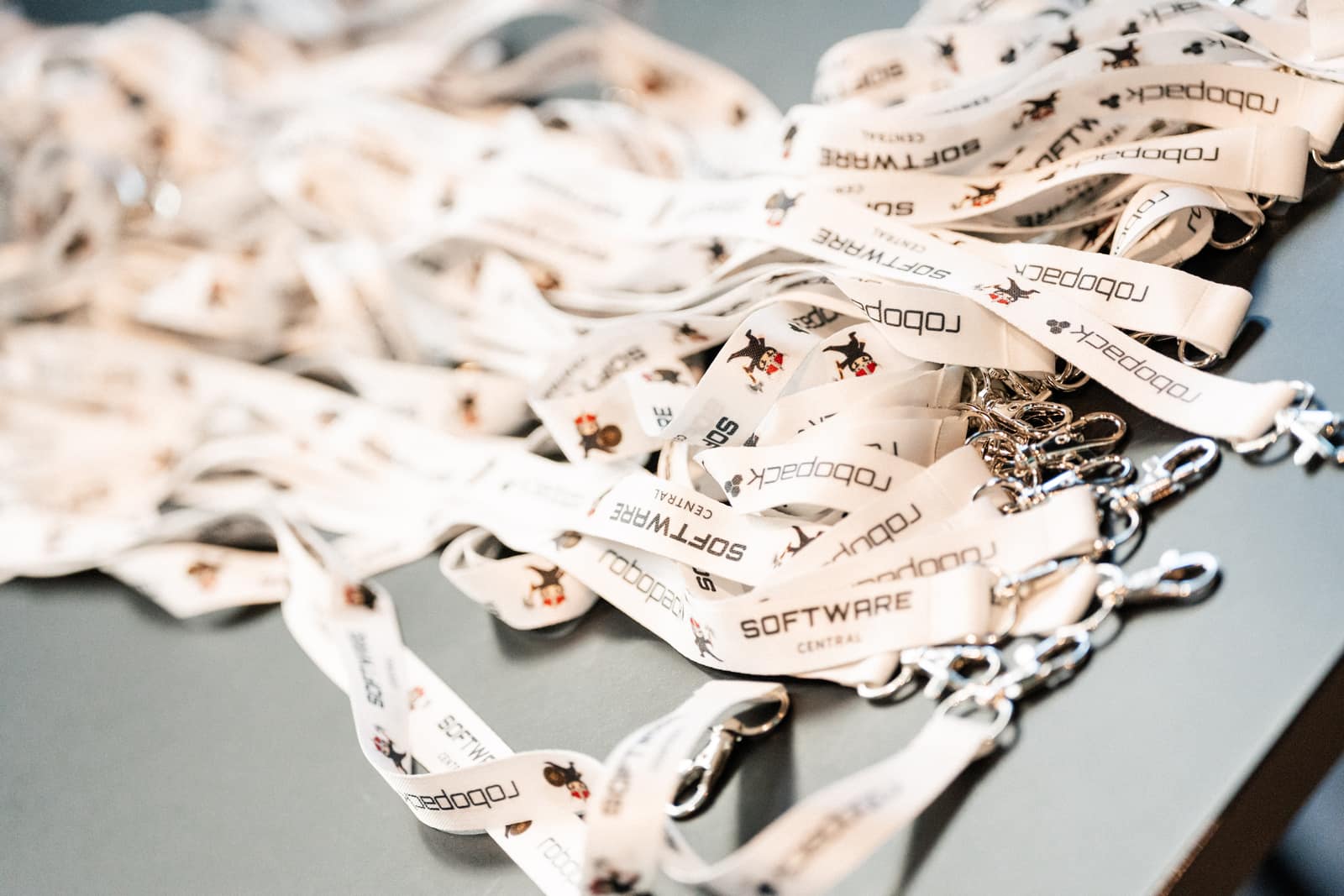 Lanyards branded with sponsor logos at Workplace Ninjas Norway 2026